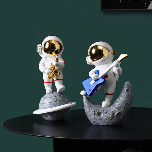 Statue Astronaute Musicien sur Planète